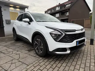 Kfz gutachten kia sportage weiss frontansicht schraeg