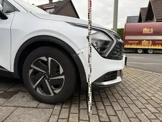 Schadensdokumentation kia sportage frontschaden kotfluegel messlatte