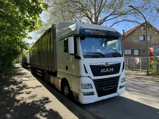 Lkw gutachten man sattelzug planenauflieger seitenansicht